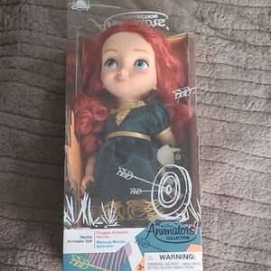 Disney Animator's Collection Doll with Red Hair and Dark Green Dress